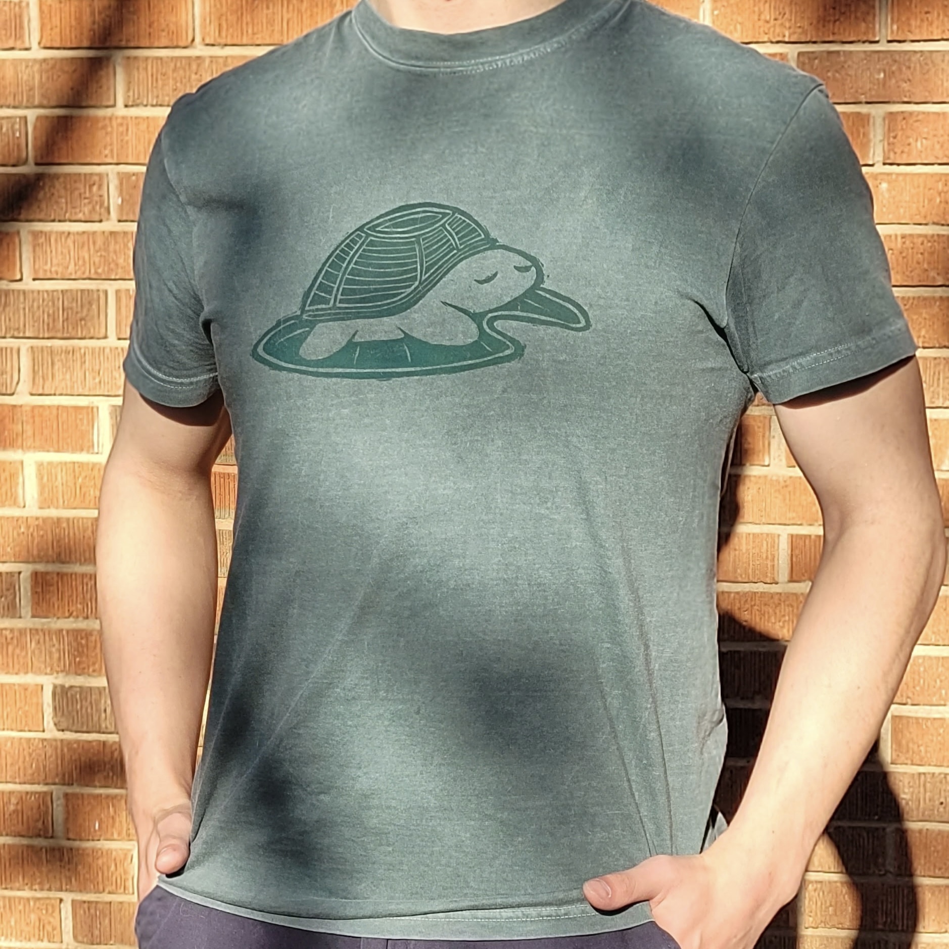 Cartoon Turtle napping on a Lilypad printed on T-shirt
